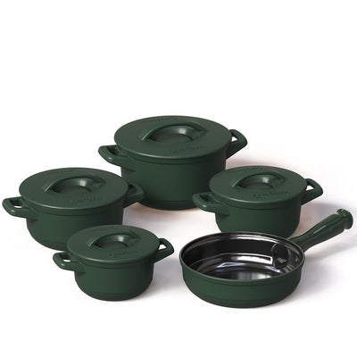 Set of green cookware pots and pans on a white background